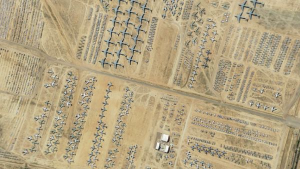 Zoom in from space down to a shore on Earth